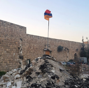 Rubble in front of wall